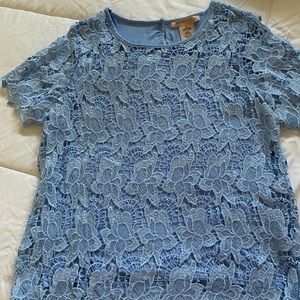 Lined lace top for work or formal wear.